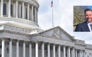 Picture of US Congress with picture of Bentley Johnson in the corner.